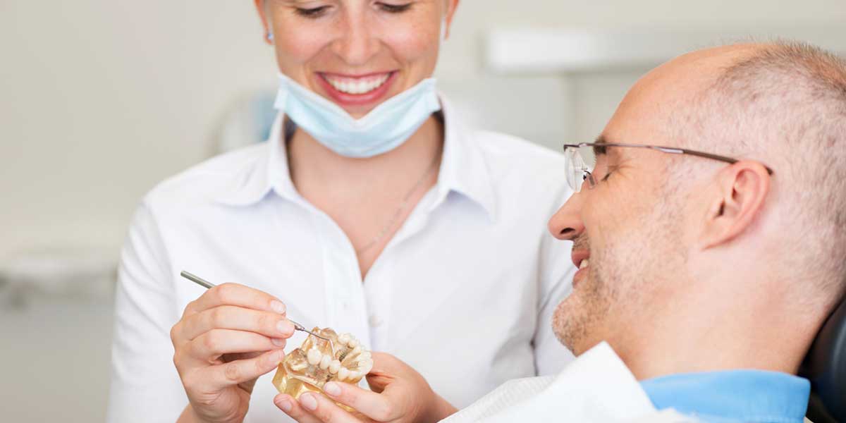 Patient with Lady Doctor In Dental
